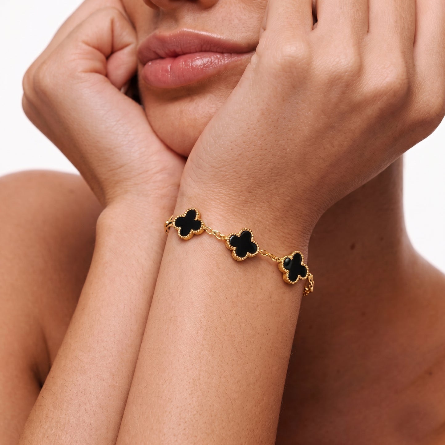 Elegant Black Quatrefoil Clover Bracelet | Gold-Tone Chain