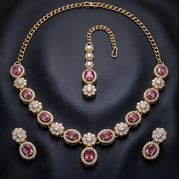 Elegant Ruby Pink & Floral Gold Necklace Set with Earrings & Maang Tikka